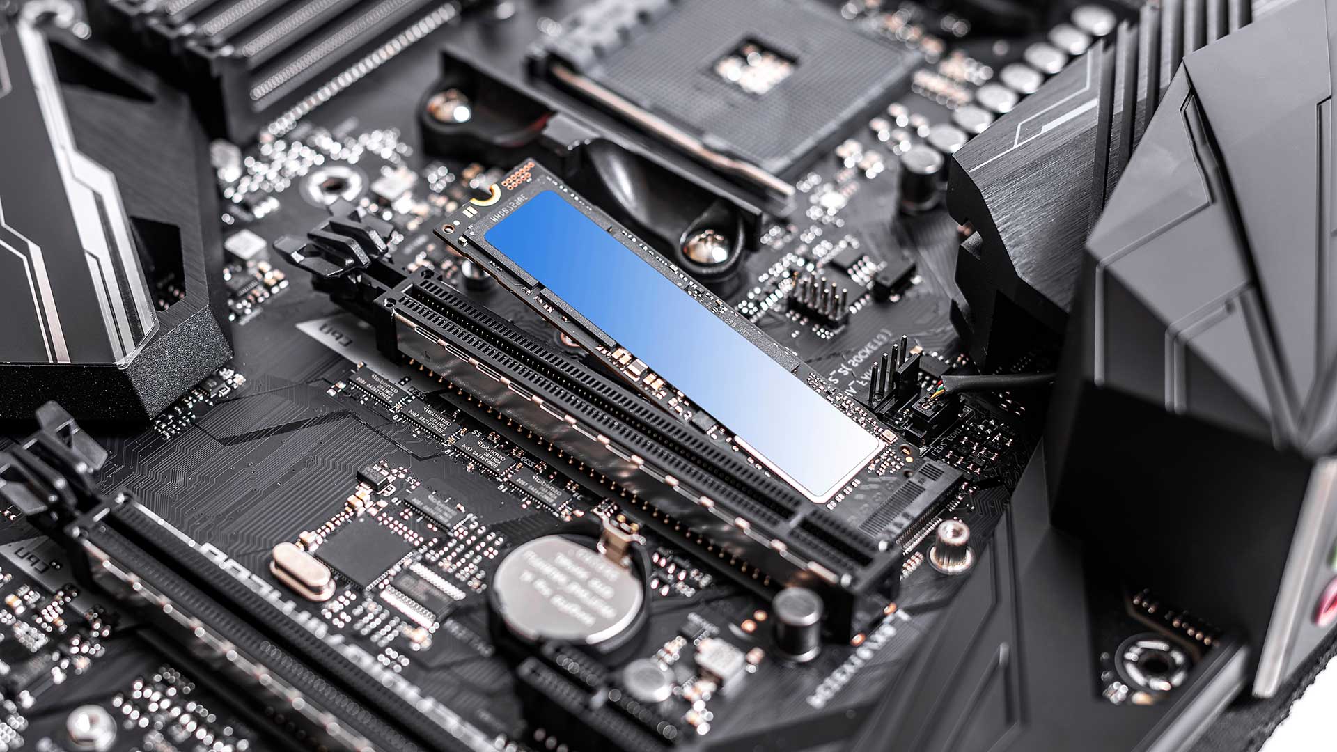 what is an ssd - an image of m.2 ssd storage being installed into a motherboard
