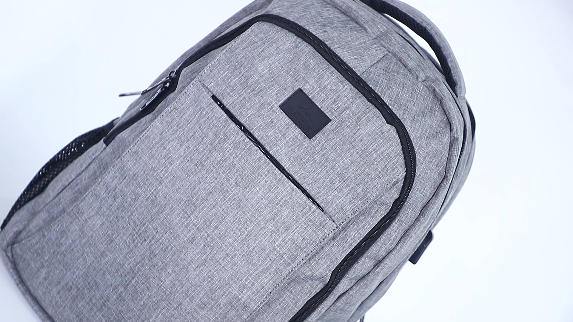 best travel bags - an image of the matein travel laptop backpack in grey
